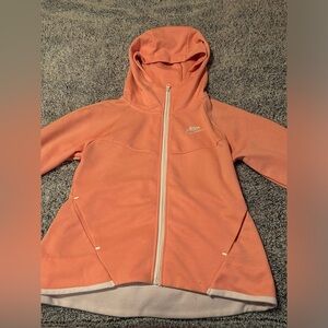 pink Nike sweater and pants